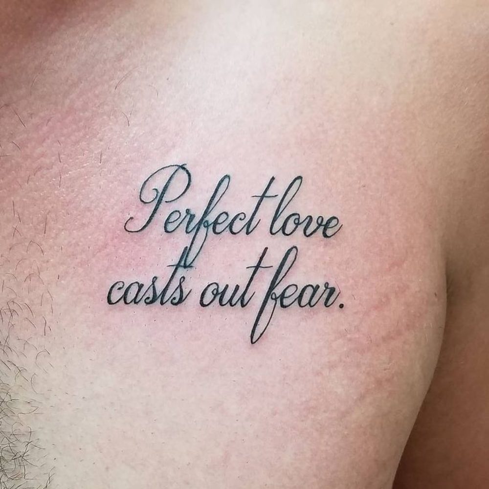 perfect-love-casts-out-fear-chest-lettering-tattoo