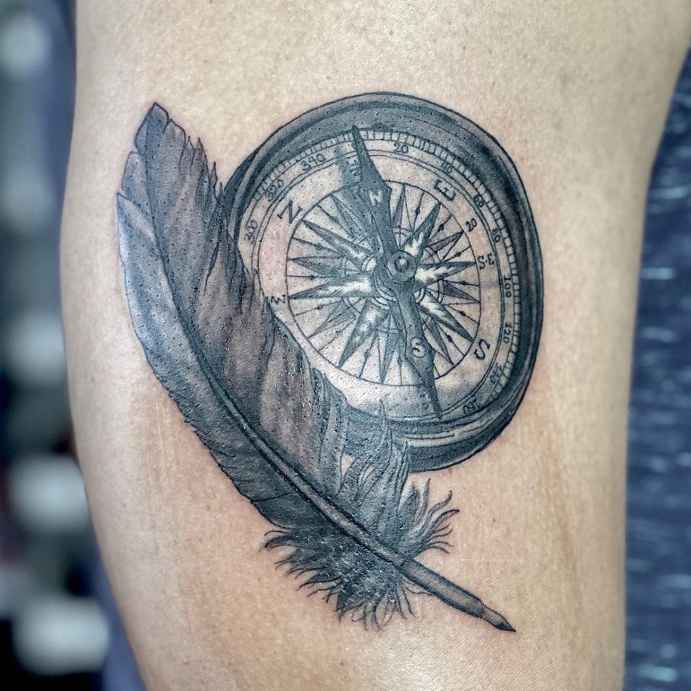 feather-and-compass