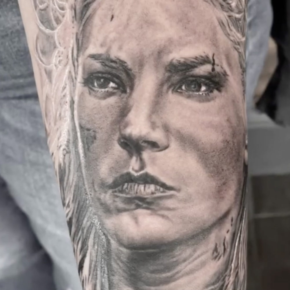 women-sleeve-portrait-tattoo